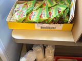 a box of food that is sitting on a shelf