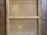 an old wooden window frame with a window in the middle of it