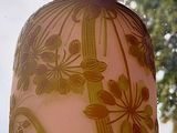 a vase that is sitting on a window sill