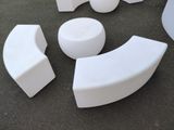 several pieces of white plastic sitting on the ground
