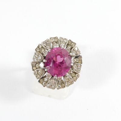 a pink sapphire and diamond cluster ring