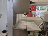 an image of a kitchen with a mixer and a large bowl