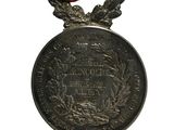 medal with a ribbon around it on a white background