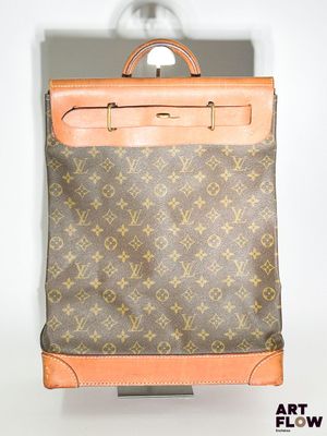 Sac à dos Louis Vuitton en toile Monogram et cuir