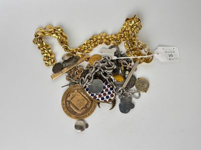 a gold chain with a bunch of charms on it