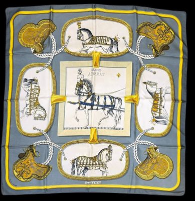 a square scarf with a picture of a horse and carriage on it