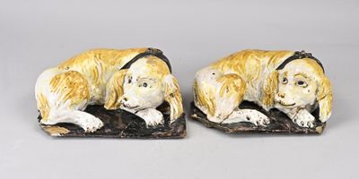pair of ceramic dog bookends on marble bases