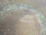 a close up of a metal pot with a lid