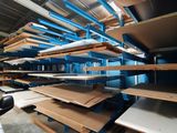 shelves in a warehouse with a lot of cardboards on them
