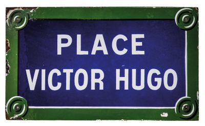 blue and white sign with the words place victor hugo on it