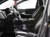 a picture of the inside of a car with the door open