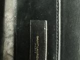 a close up of the inside of a black leather purse