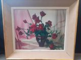 painting of red roses in a vase on a table in front of a pink curtain