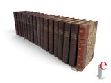 a lot of books that are lined up on a shelf