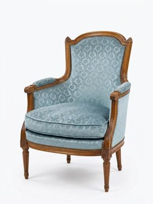 une chaise rembourrée dont l'assise est recouverte d'un tissu bleu