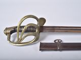 an old sword with a brass handle and a wooden sheath