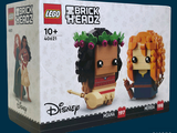 une boîte contenant une figurine Lego représentant un homme et une femme