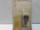 a plastic package with a remote control inside of it