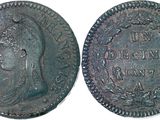 a close up of a coin with an image of a woman on it