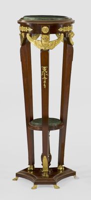a wooden table with a marble top on it