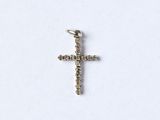 a diamond cross pendant on a white background