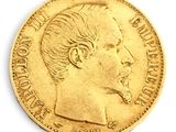an image of a close up of a gold coin with a man ' s face on it