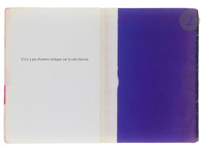 an open book with a picture of a purple and blue cover
