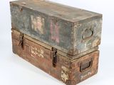 two old suitcases stacked on top of each other