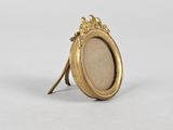 a gold plated ring with a picture of a crown on it