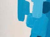 an abstract painting of blue and yellow shapes on a white background