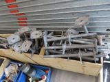 many different types of bolts and screws in a box