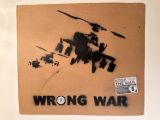 a picture of a sign that says wrong war