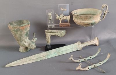 many different items that are on display on a table