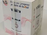 a box that has a blender in it on a table