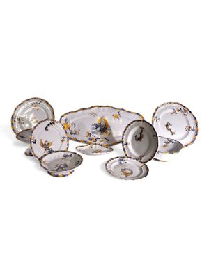 a lot of plates that are sitting on a table