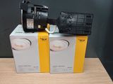 two boxes that have a camera on top of them