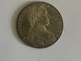 a coin with a picture of a woman on it