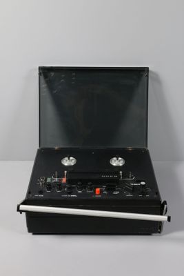 a black box with two speakers in it on a white surface