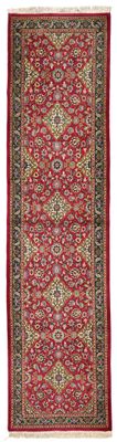 un tapis rouge et noir à motifs