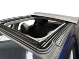 a close up of a car window with a sunroof
