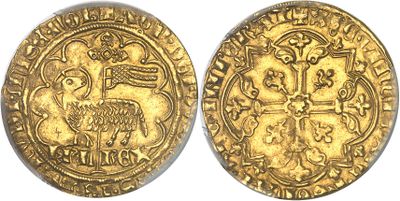 a gold coin with an image of a bird on it
