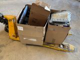 a yellow fork truck with boxes on the back of it