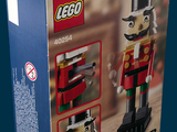 a box with a toy soldier in it on a table