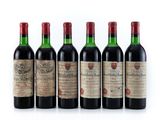 six bottles of red wine lined up in a row on a white surface