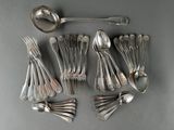 a lot of silver spoons and spoon spoons on a table