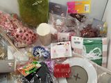 a white box filled with assorted items on a table