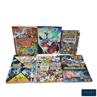 beaucoup de livres sur les Pokémon sur la table