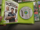 someone is holding a green case with a dvd inside of it