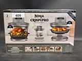 packaging of the ninja crisppro air fryer is shown in the box
