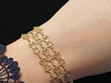 bracelet with a gold chain and a gold chain bracelet with a gold chain and a gold chain bracelet with a gold chain and a gold chain with a gold chain with
